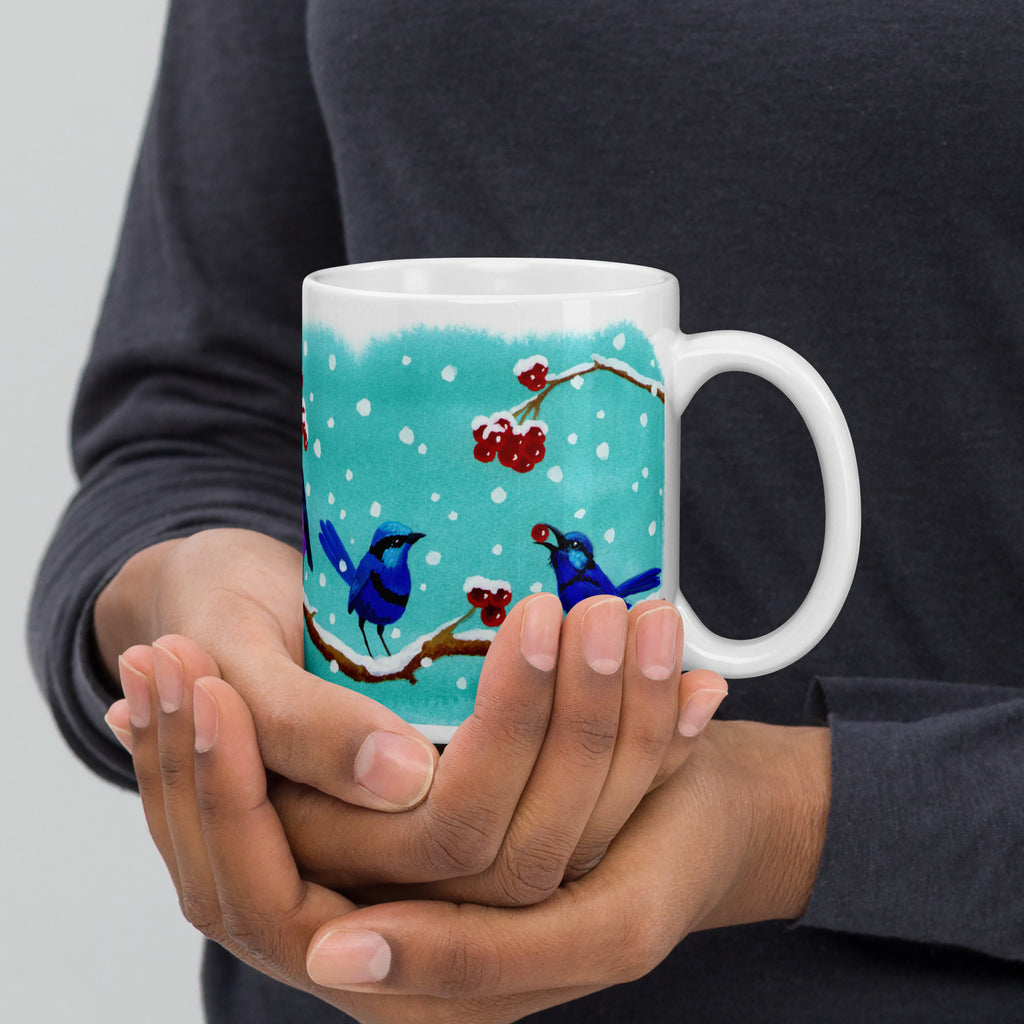 Julmugg med fåglar i snö