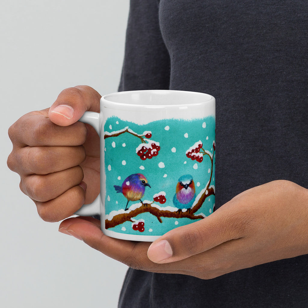 Julmugg med fåglar i snö